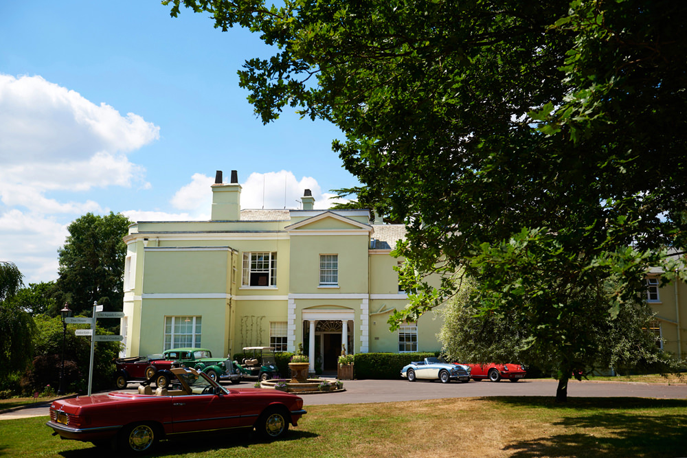 view of front of Deer Park with cars outside