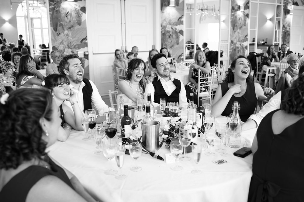 top table in complete laughter during father of bride speech